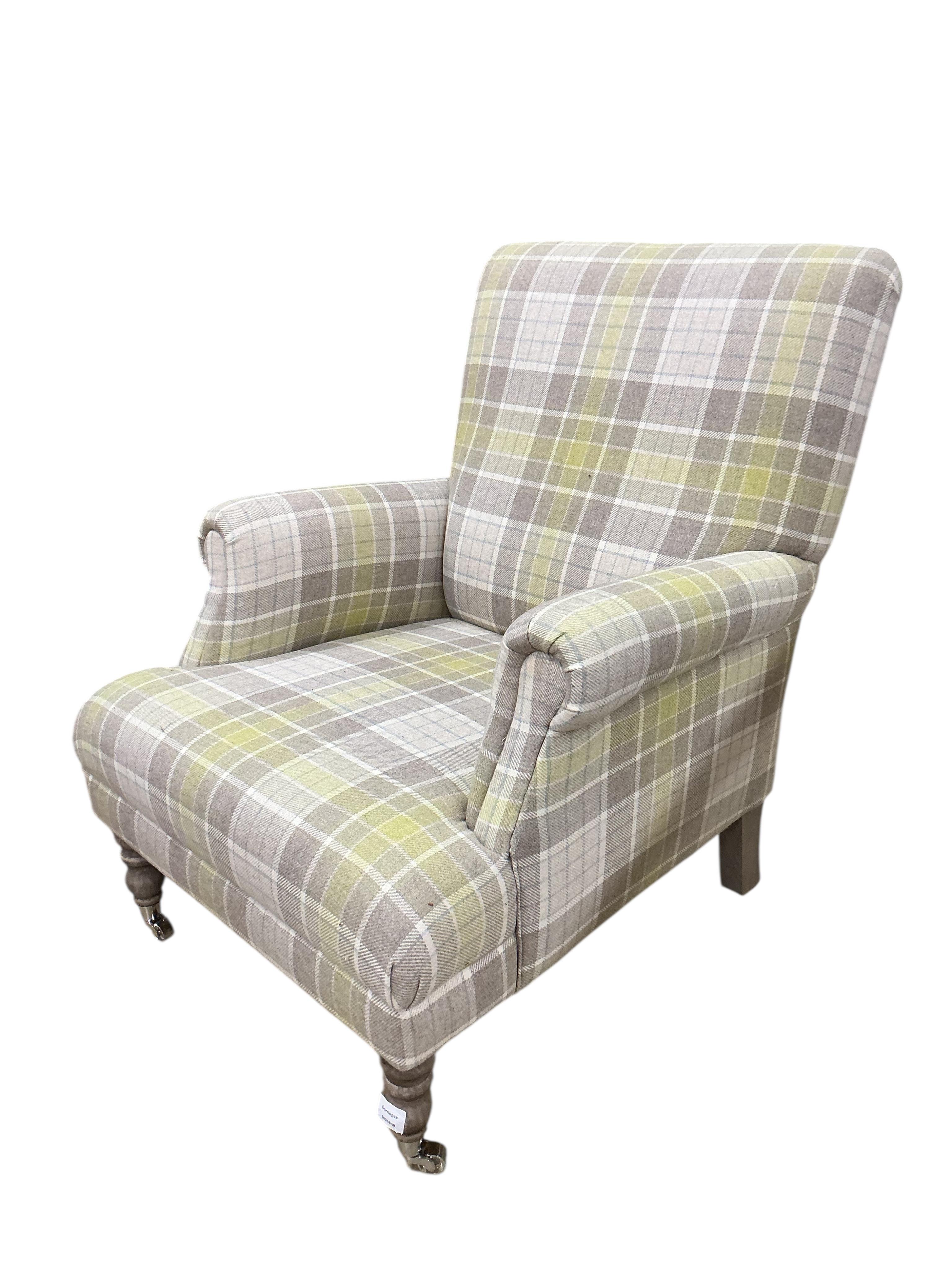 A modern Victorian style wing armchair upholstered in tartan type fabric, width 76cm, depth 76cm, height 90cm